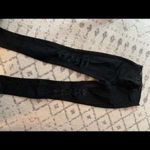 Ripped black J Brand jeans